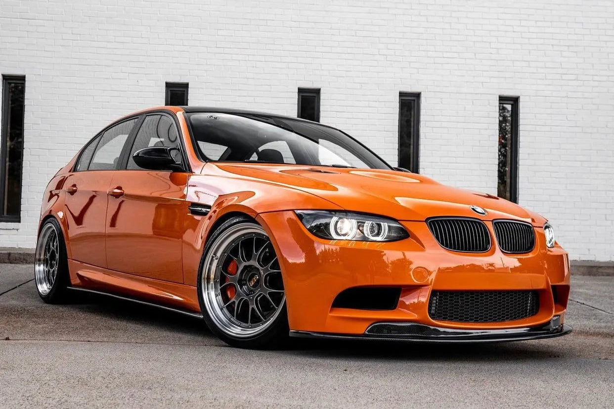 Orange BMW WE90 M3 with CRBN Industries Dry Carbon Fiber GTS Style Front Lip