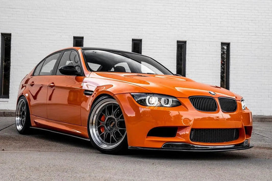 Orange BMW WE90 M3 with CRBN Industries Dry Carbon Fiber GTS Style Front Lip